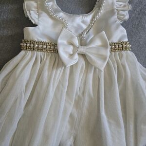 Elegant White Baby Dress with Bow and Pearl Details